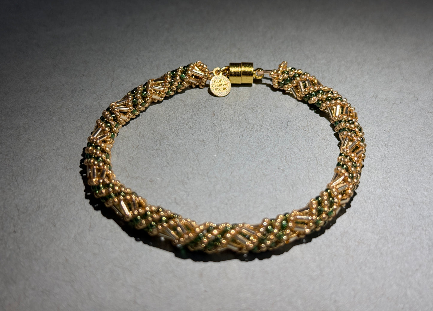 Gold and Green Spiral Bracelet