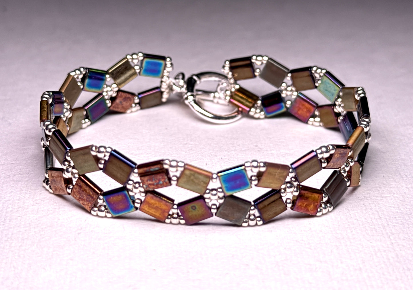 Elegant X's and O's Toggle Clasp Style Bracelet