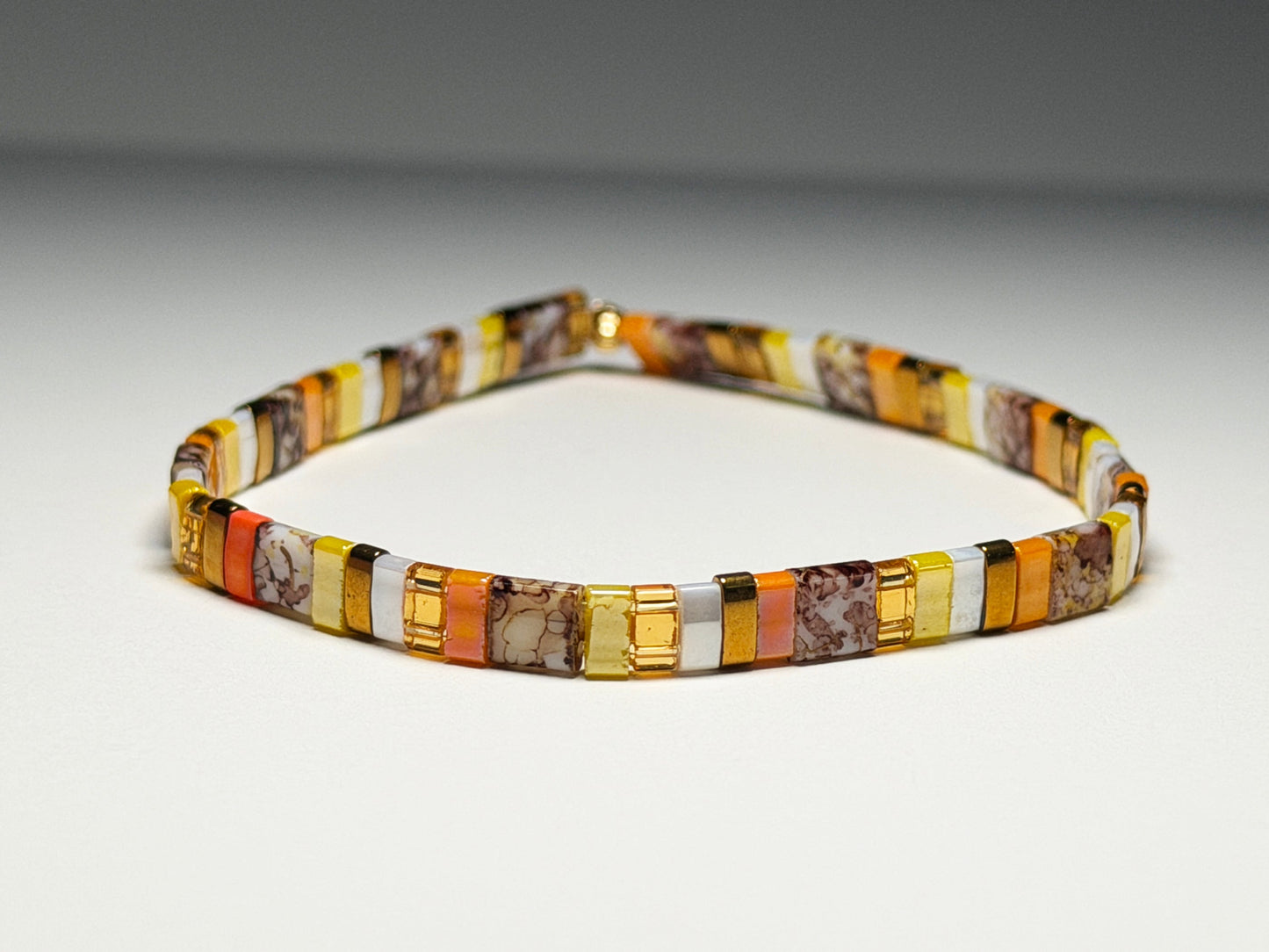 Equinox Stretch Bracelets Single (Mostly Reds and Yellows )